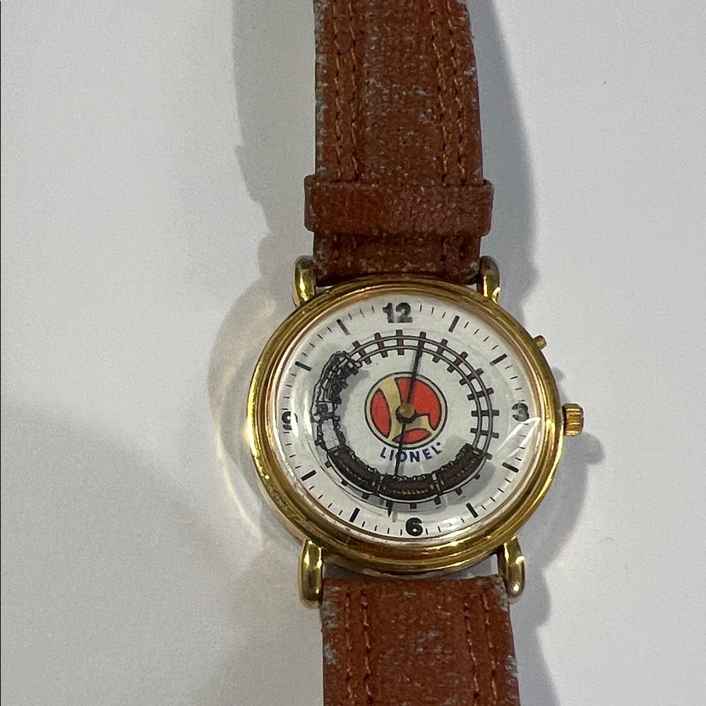 (42)Vintage Lionel Gold and Brown Men's Watch…